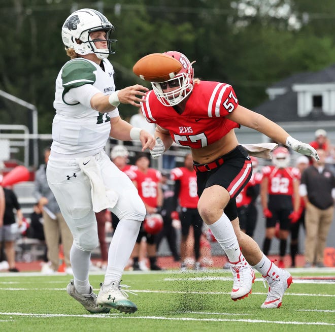 Bridgewater State University linemen Justin Hernandez pressures Plymouth State University quarterback Braden Lynn during a game on Saturday , Sept. 16, 2023.