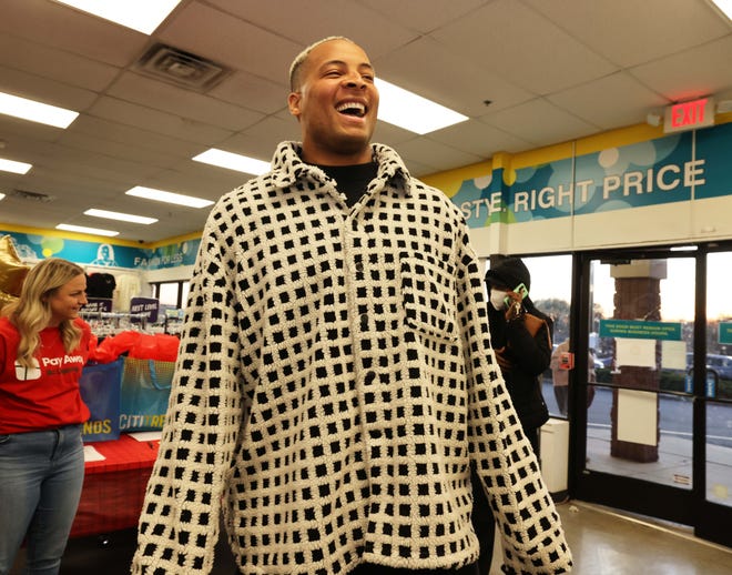 Nonprofit Pay Away teamed up with New England Patriots tight end Pharaoh Brown for a surprise holiday payoff event at Brockton Citi Trends on Tuesday, Dec. 12, 2023.