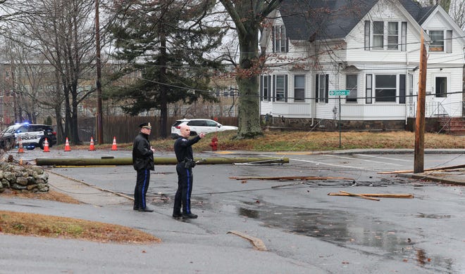 Utility poles and trees were down on Stetson and Pearl streets in Bridgewater during a storm on Monday, Dec. 18, 2023.