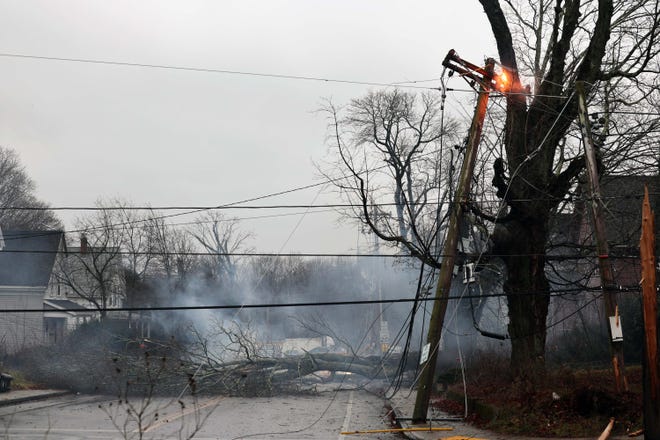 Utility poles and trees were down on Stetson and Pearl streets in Bridgewater during a storm on Monday, Dec. 18, 2023.