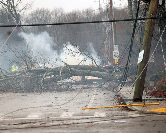 Utility poles and trees were down on Stetson and Pearl streets in Bridgewater during a storm on Monday, Dec. 18, 2023.