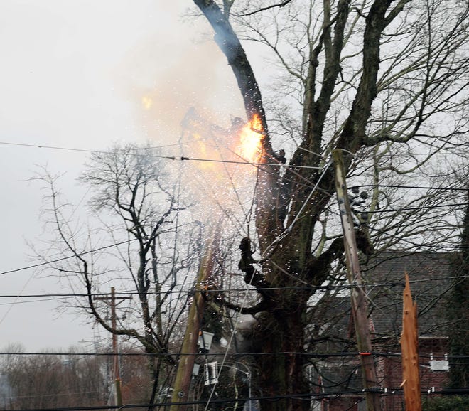 Utility poles and trees were down on Stetson and Pearl streets in Bridgewater during a storm on Monday, Dec. 18, 2023.