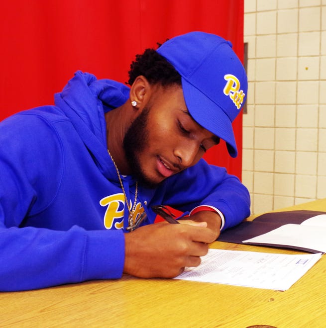 Cameron Monteiro of Brockton, a 6-3 wide receiver for the Boxers, makes it official on Wednesday, Dec. 20, 2023, as he signs his national letter of intent to play football at the University of Pittsburgh in 2024. Monteiro is a straight-A student, according to his father, Jose, but has yet to decide what his degree will be in.