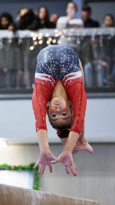 Bridgewater-Raynham/West Bridgewater's Amanda Ogilvie competes in the beam event at Spectrum Gymnastics on Saturday, Jan. 13, 2024.